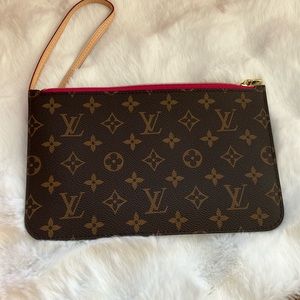 Louis Vuitton pochette bareley used.